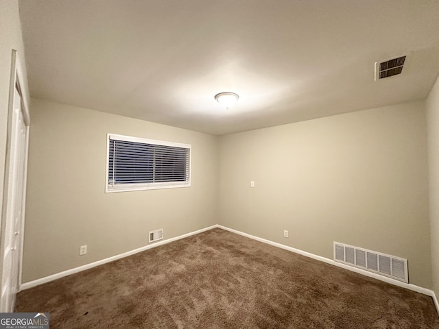 unfurnished room with carpet