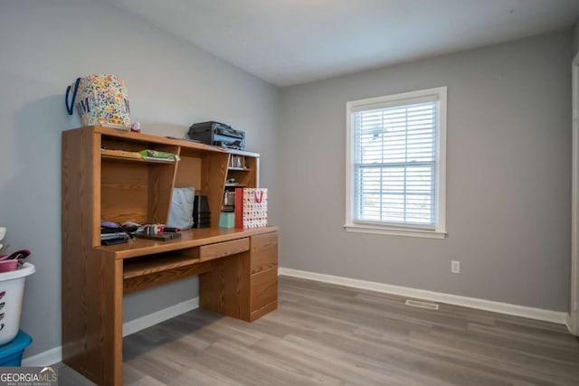 office space featuring hardwood / wood-style flooring