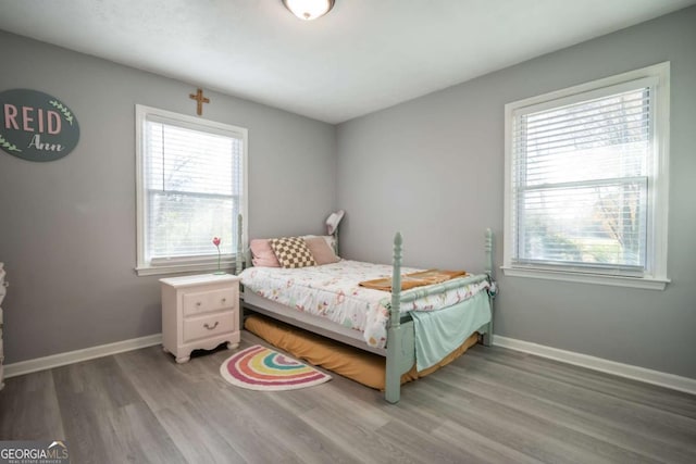 bedroom featuring hardwood / wood-style flooring