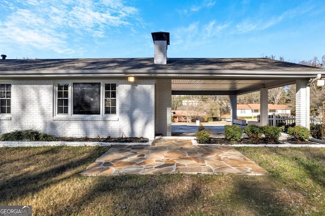 exterior space featuring a front yard