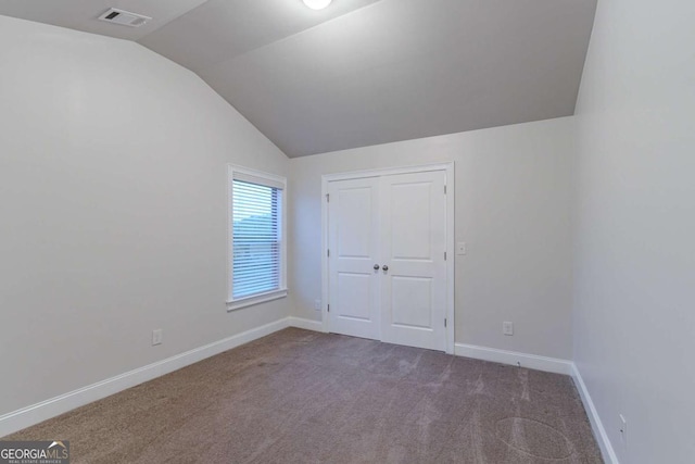 interior space with vaulted ceiling