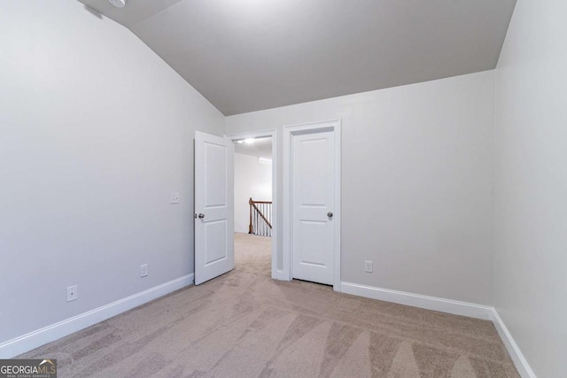 interior space featuring vaulted ceiling