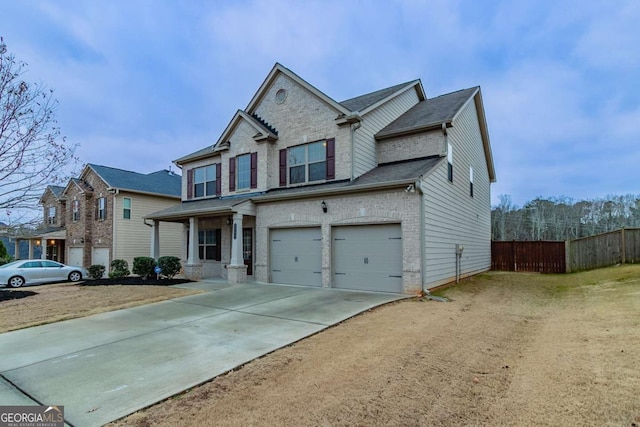 view of front of property featuring a porch and a garage