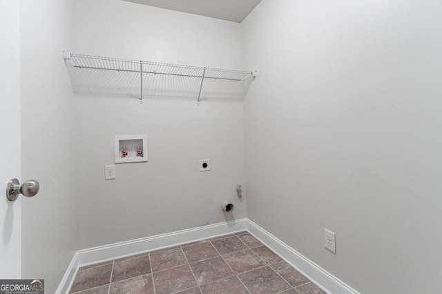 laundry area with hookup for an electric dryer and washer hookup