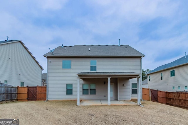 rear view of property with a patio area