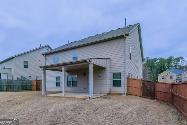 back of house featuring a patio