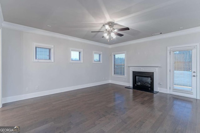 unfurnished living room featuring ceiling fan, crown molding, and dark wood-type flooring