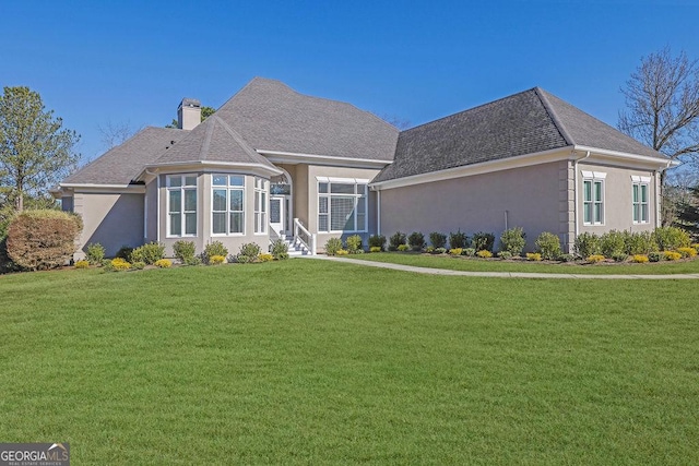 view of front of house with a front yard