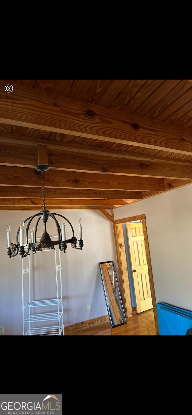 room details featuring beamed ceiling and wood ceiling