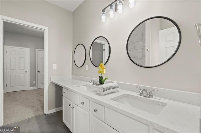 bathroom with vanity and tile patterned floors