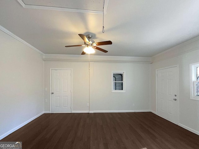 interior space with ceiling fan, dark hardwood / wood-style flooring, and ornamental molding