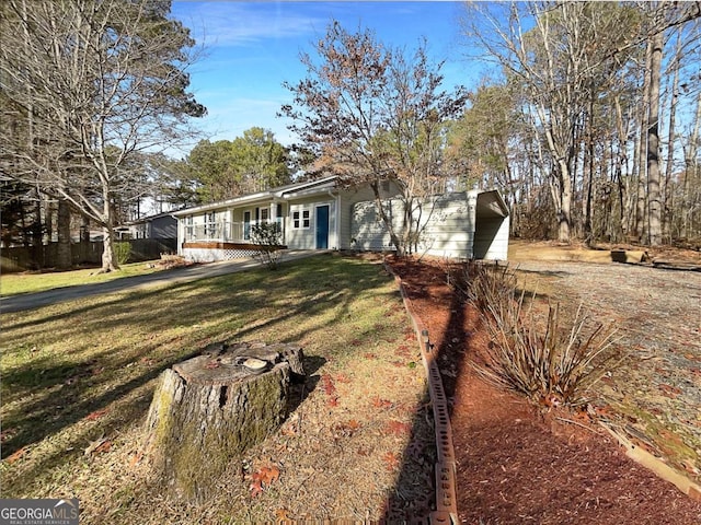 view of front of home with a front yard