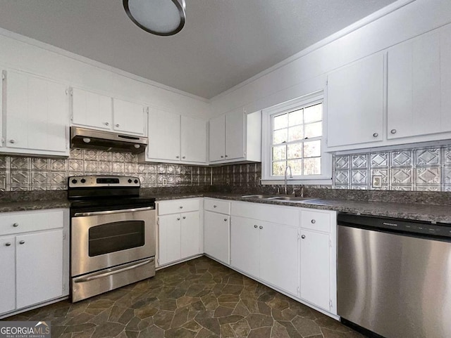 kitchen featuring sink, white cabinets, and appliances with stainless steel finishes