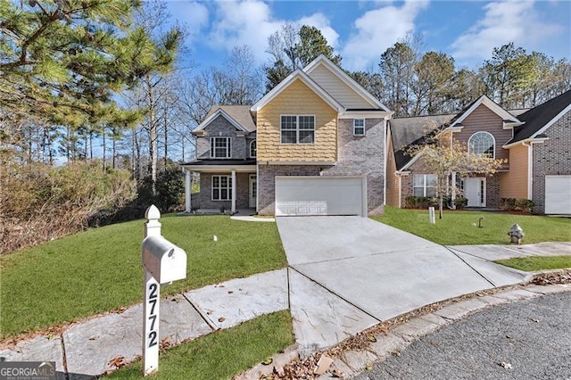 view of property featuring a front yard and a garage