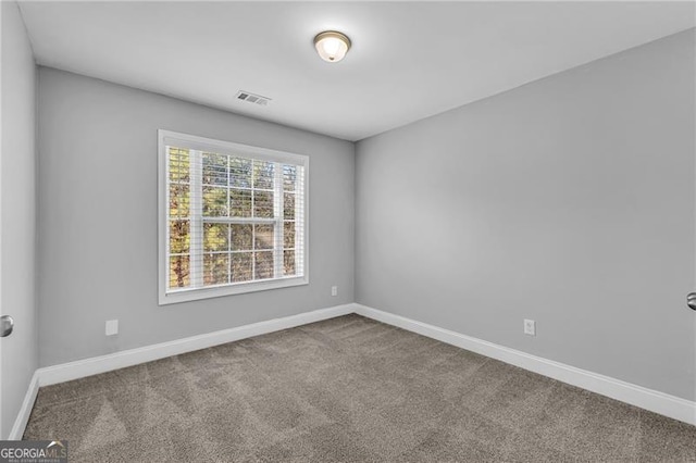 view of carpeted spare room