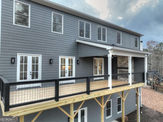 rear view of property with french doors