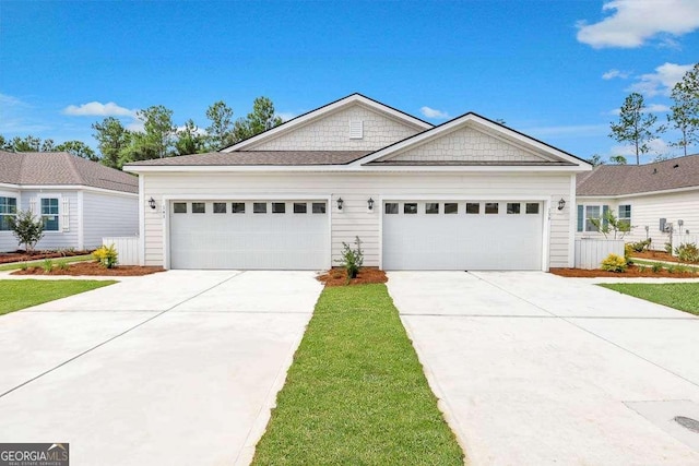 single story home featuring a garage