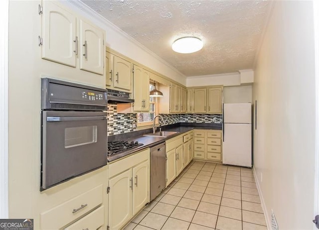 kitchen with light tile patterned flooring, sink, appliances with stainless steel finishes, and tasteful backsplash