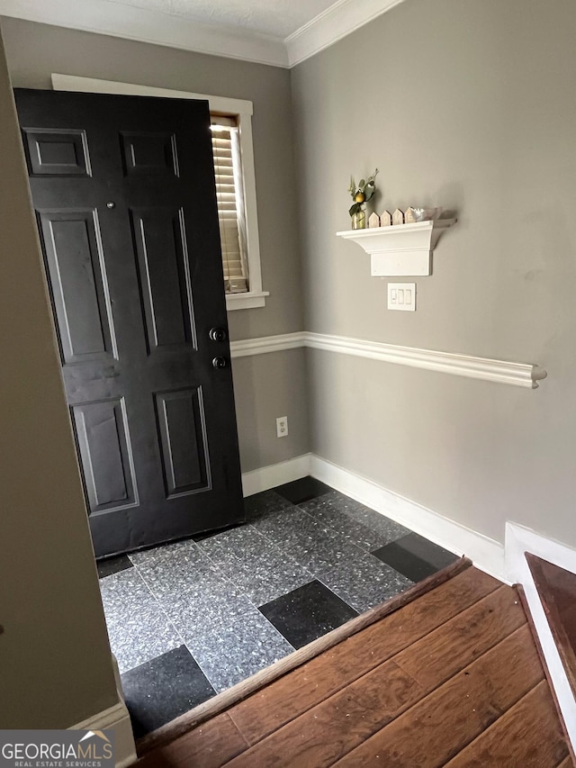 foyer entrance with ornamental molding