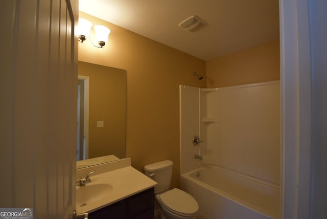 full bathroom featuring vanity, toilet, and shower / tub combination