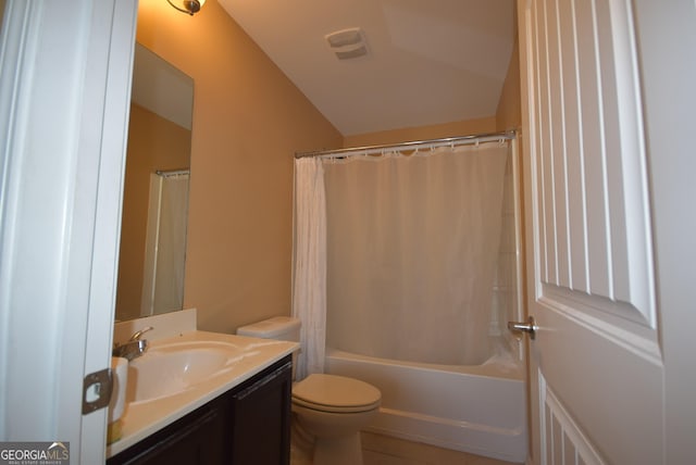 full bathroom featuring vanity, toilet, shower / bathtub combination with curtain, and lofted ceiling