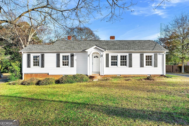 ranch-style house featuring a front lawn