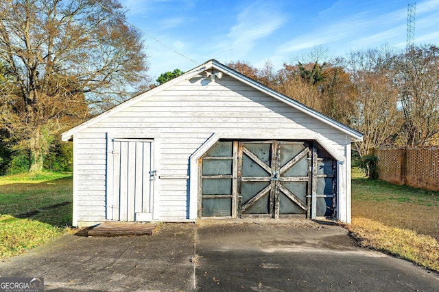 view of outbuilding featuring a garage