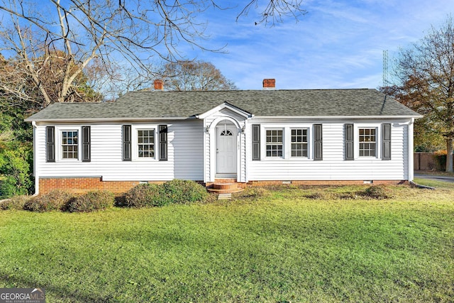 ranch-style home with a front yard