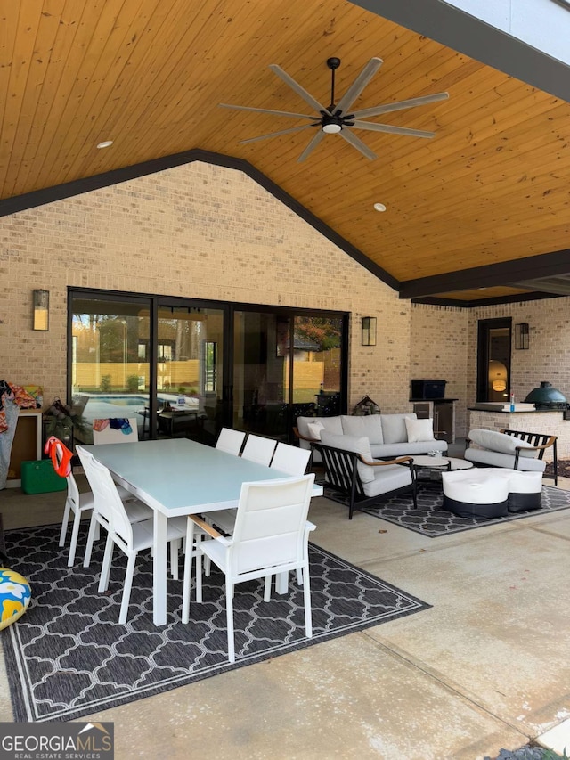 view of patio / terrace with an outdoor living space and ceiling fan