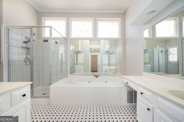 bathroom with vanity, a wealth of natural light, plus walk in shower, and ornamental molding