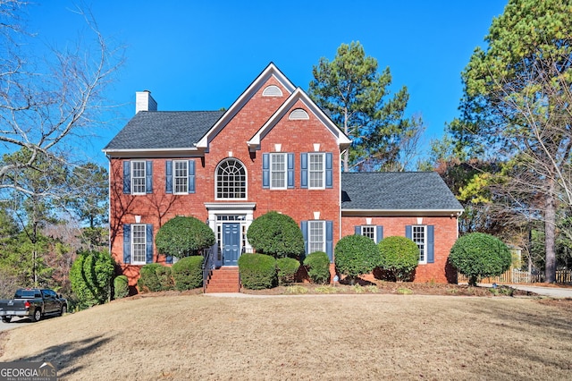 view of front of property featuring a front yard