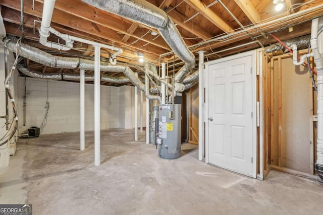 unfinished basement featuring water heater