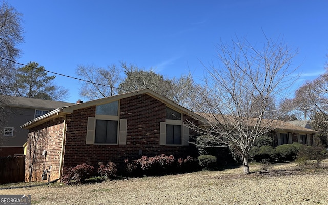 view of front of property with brick siding