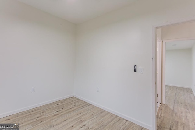 empty room featuring light hardwood / wood-style floors