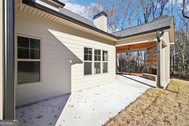 view of patio featuring ceiling fan