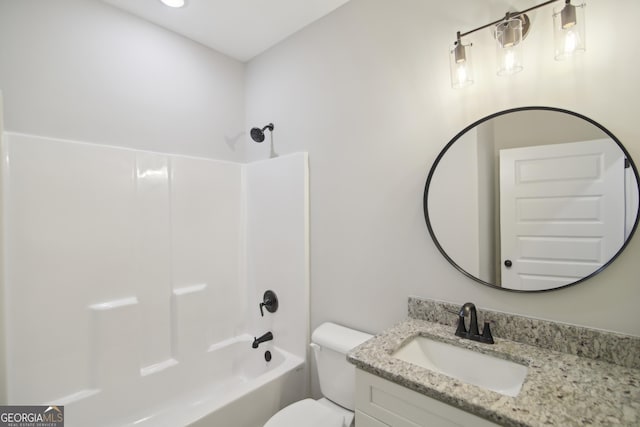 full bathroom featuring vanity, shower / bathtub combination, and toilet