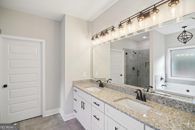 bathroom featuring tile patterned flooring, vanity, and independent shower and bath