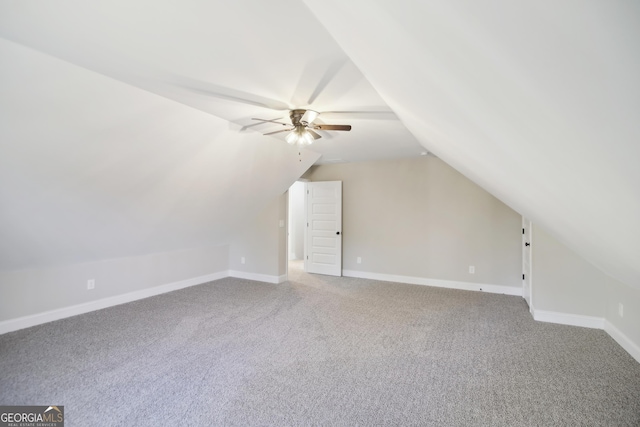 bonus room featuring ceiling fan, carpet, and lofted ceiling