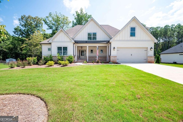 modern farmhouse style home with a porch, a front yard, and a garage