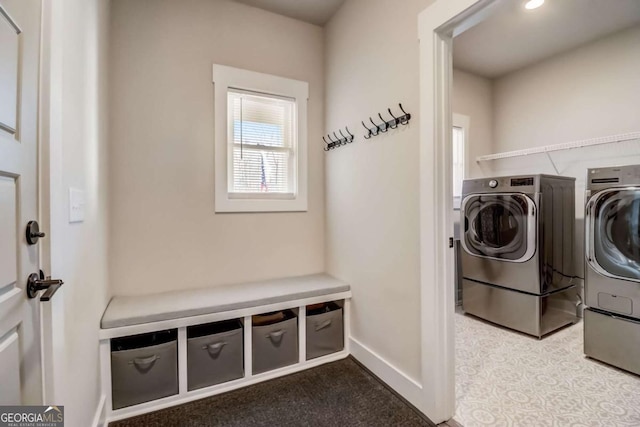 laundry room with independent washer and dryer