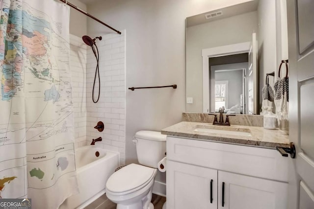 full bathroom featuring vanity, toilet, and shower / bath combo