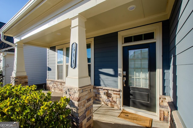 property entrance featuring a porch