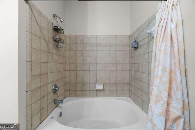 bathroom featuring shower / bath combination with curtain