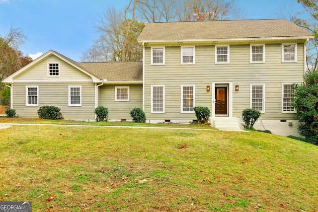 view of front of property featuring a front lawn