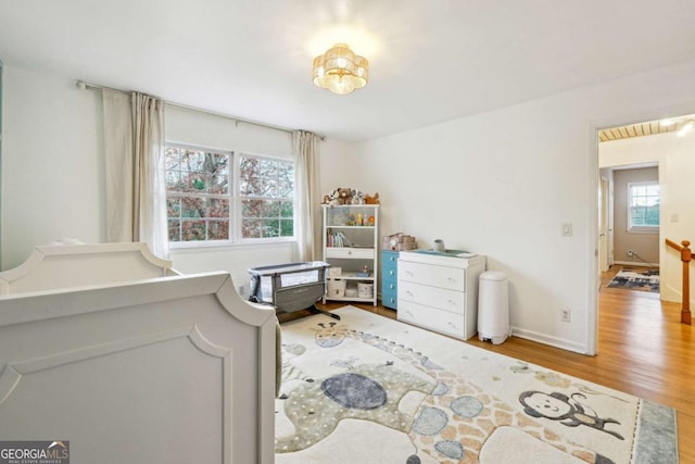 bedroom featuring hardwood / wood-style floors