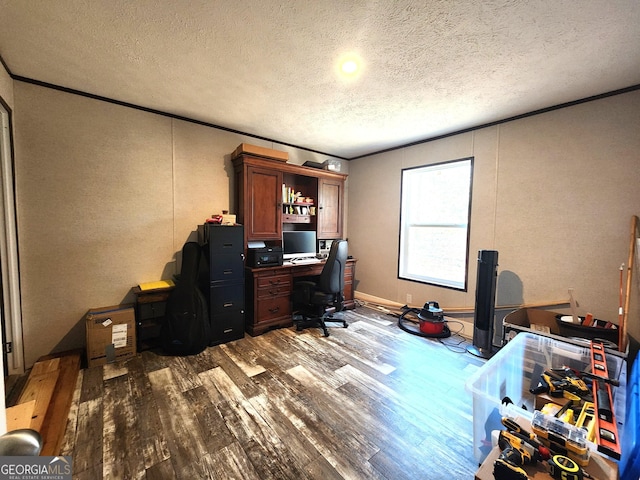 office space with hardwood / wood-style floors and a textured ceiling