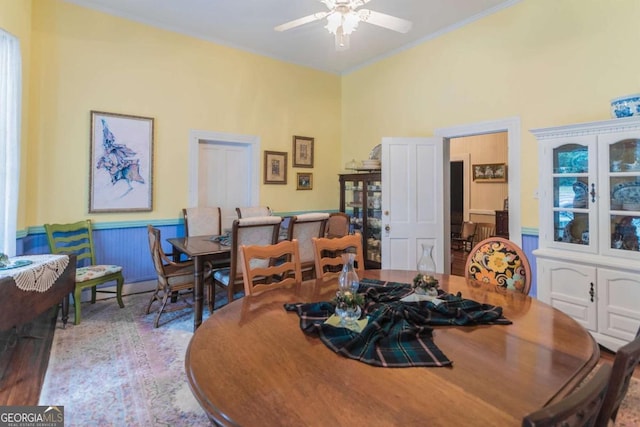 610 W Liberty, Claxton, GA 30417 - dining space featuring ceiling fan, wood-type flooring, and ornamental molding