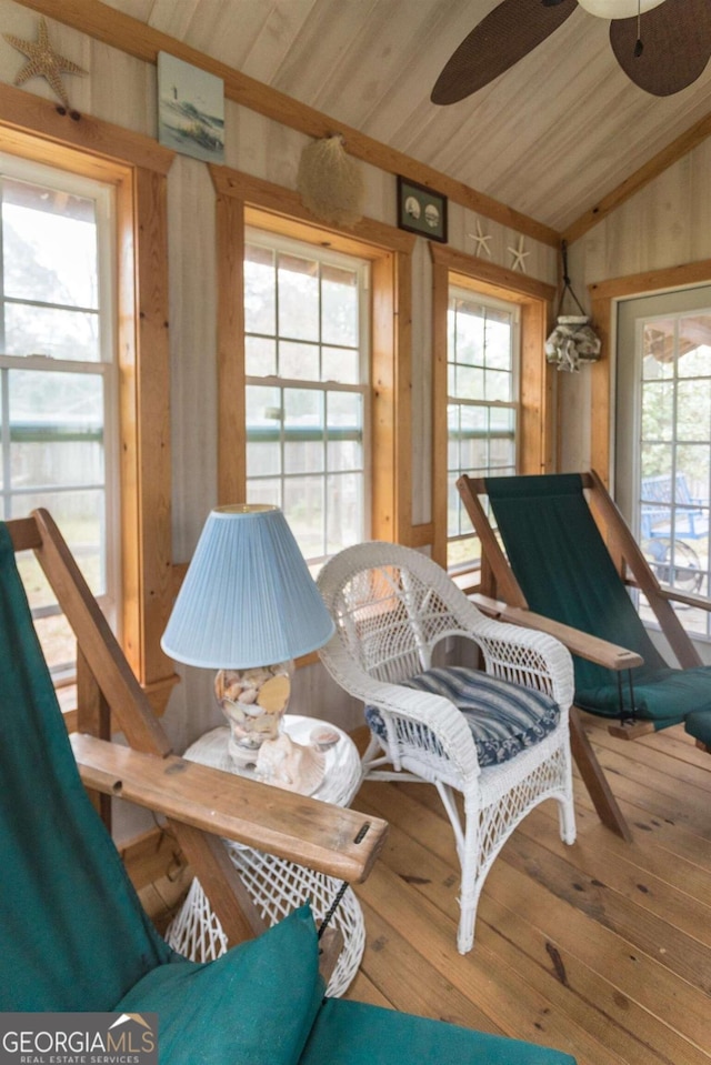 610 W Liberty, Claxton, GA 30417 - interior space with hardwood / wood-style flooring, ceiling fan, wooden walls, and vaulted ceiling