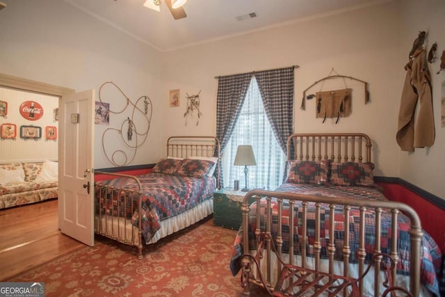 610 W Liberty, Claxton, GA 30417 - bedroom with hardwood / wood-style flooring, ceiling fan, and ornamental molding