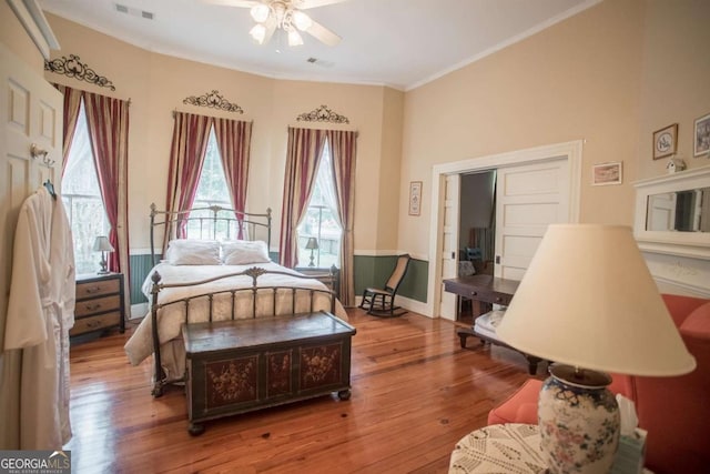 610 W Liberty, Claxton, GA 30417 - bedroom with hardwood / wood-style flooring, ceiling fan, and crown molding
